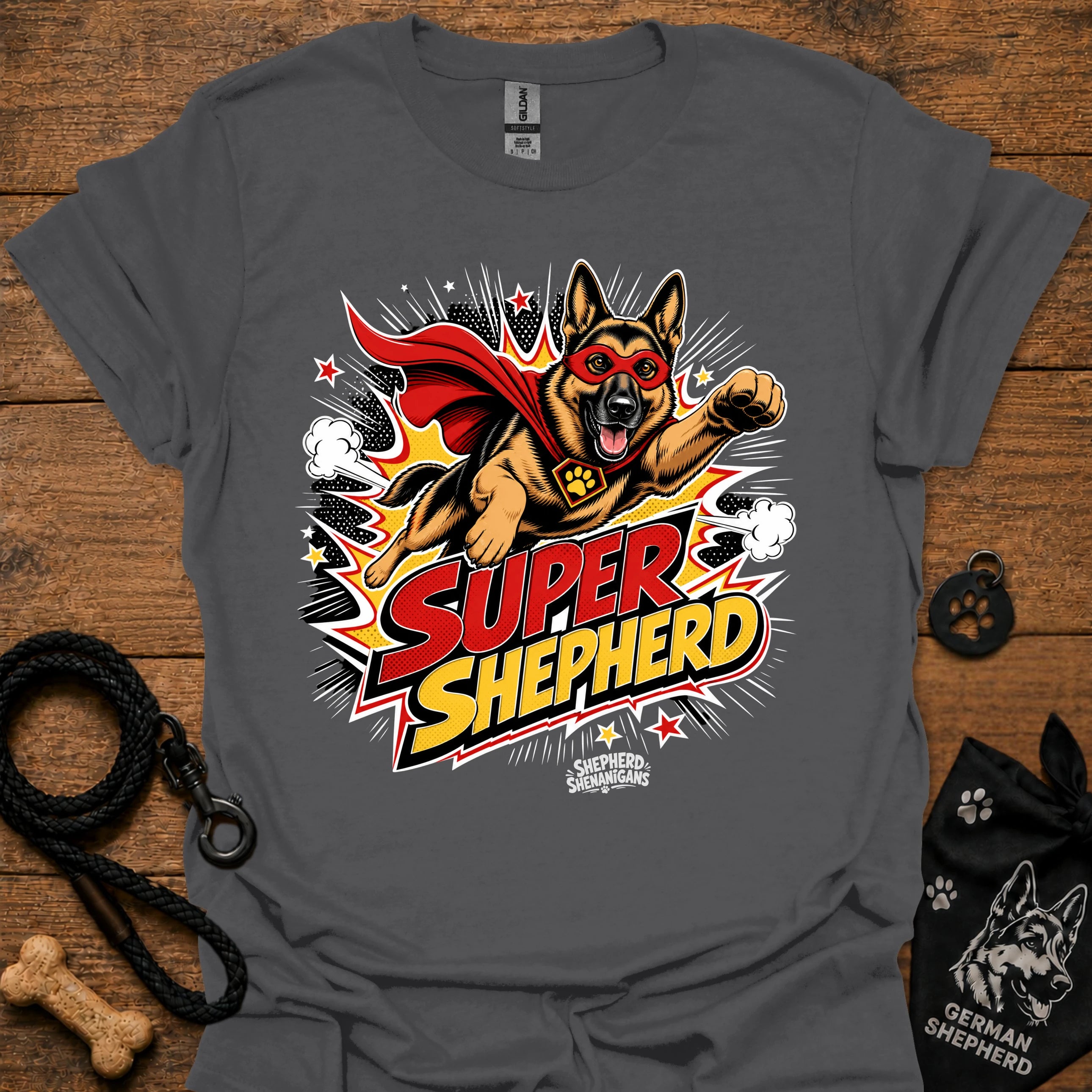 Dog graphic T-shirt in dark charcoal gray, superhero-style dog and comic logo