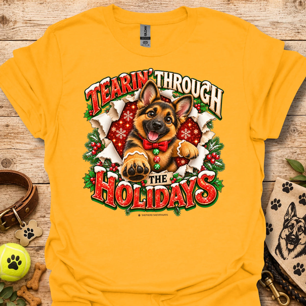 Gold T-shirt with German shepherd holiday graphic and 'Tearin' Through the Holidays'