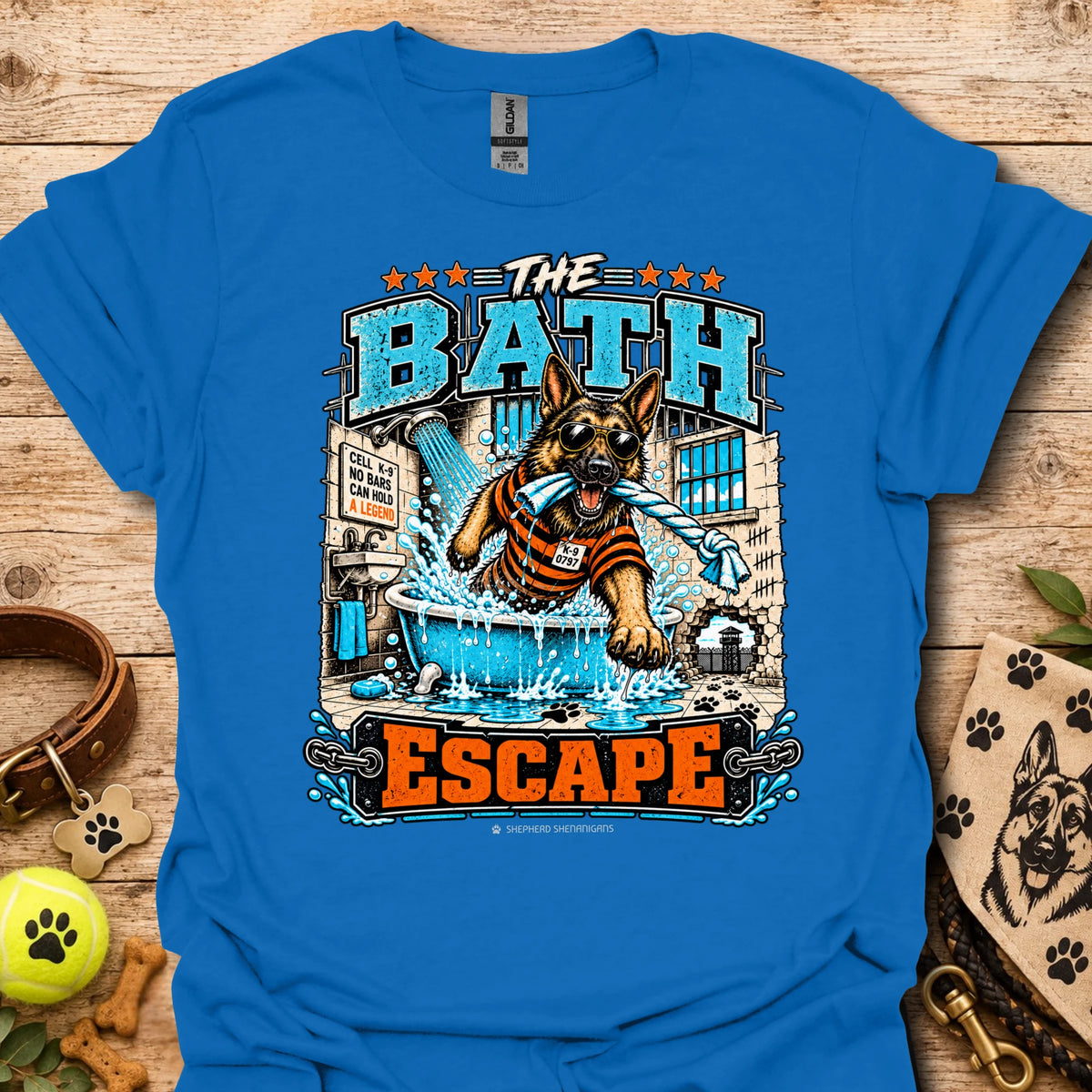 Royal blue T-shirt with dog bathing pool graphic and “The Bath Escape” text