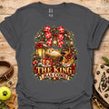 Charcoal holiday graphic T-shirt with wreath, dog, and “THE KING HAS COME” print