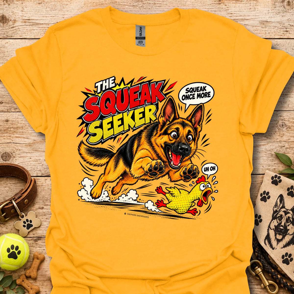 Gold graphic dog T-shirt with cartoon "Squeak Seeker" front print