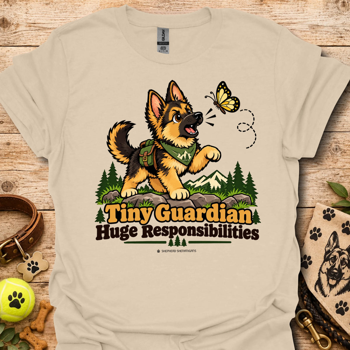 Beige kids graphic T-shirt with cartoon dog, butterfly, and "Huge Responsibilities"