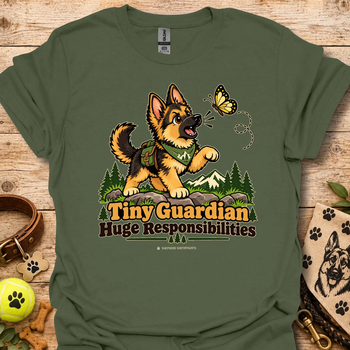 Green kids graphic T-shirt with cartoon dog, butterfly, and "Huge Responsibilities"