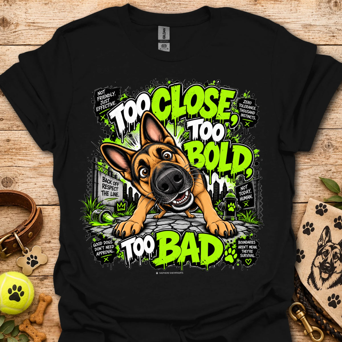 Black T-shirt with cartoon dog graphic and neon 'Too Close Too Bold Too Bad' text