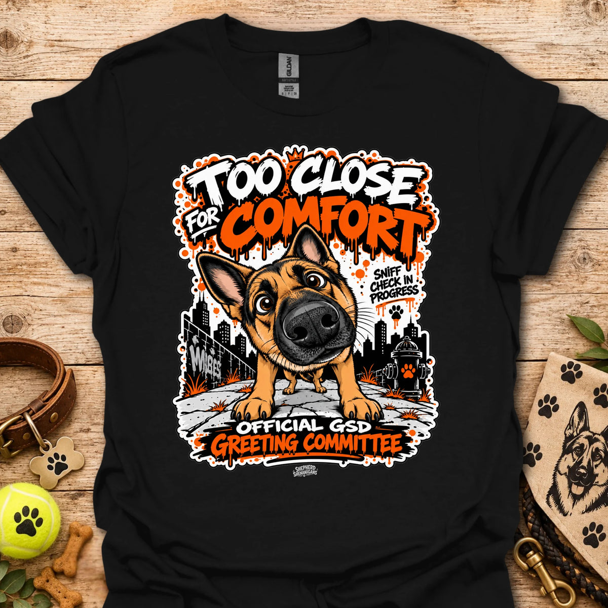 Black dog graphic t-shirt with front print and “Too Close for Comfort” text