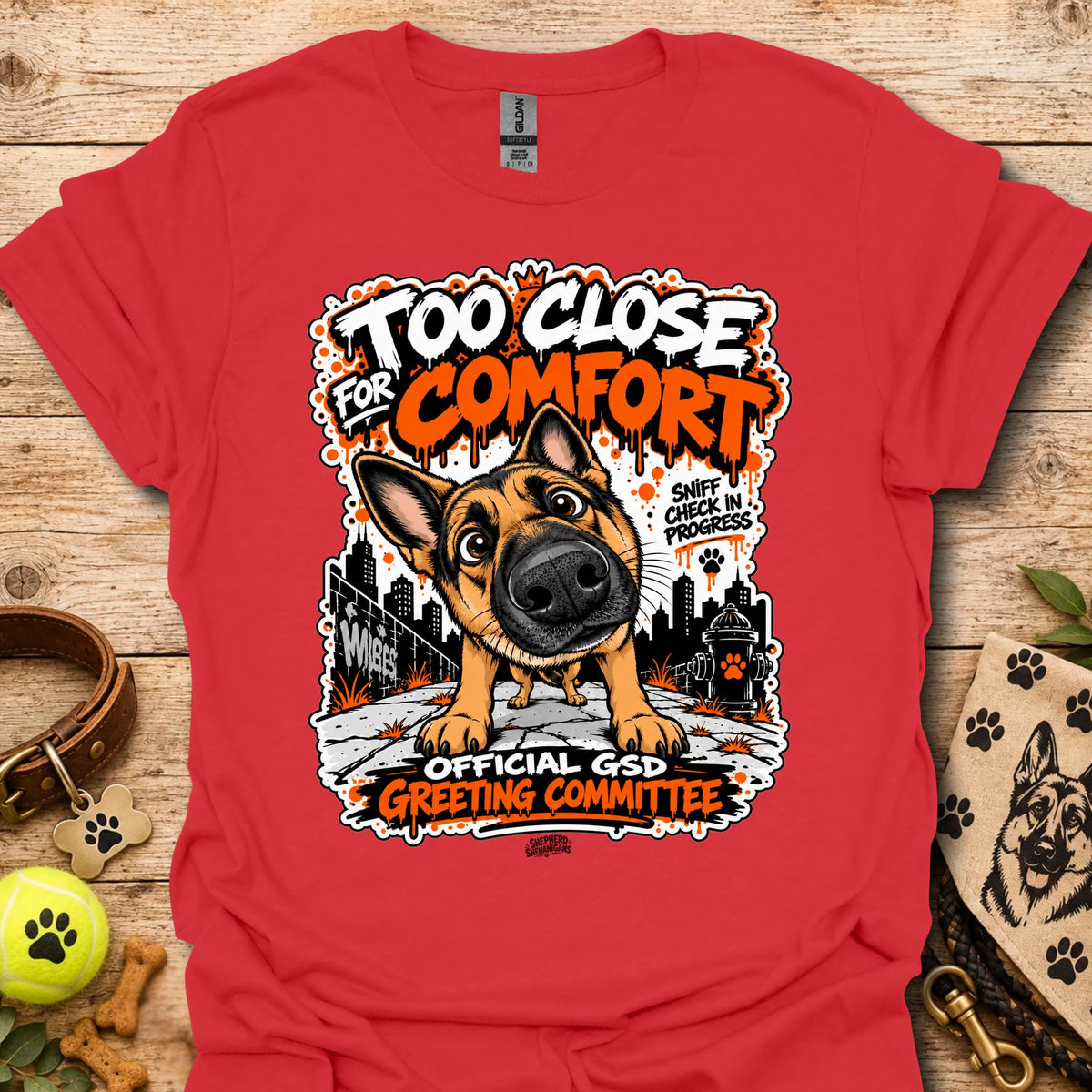 Red dog graphic t-shirt with front print and “Too Close for Comfort” text