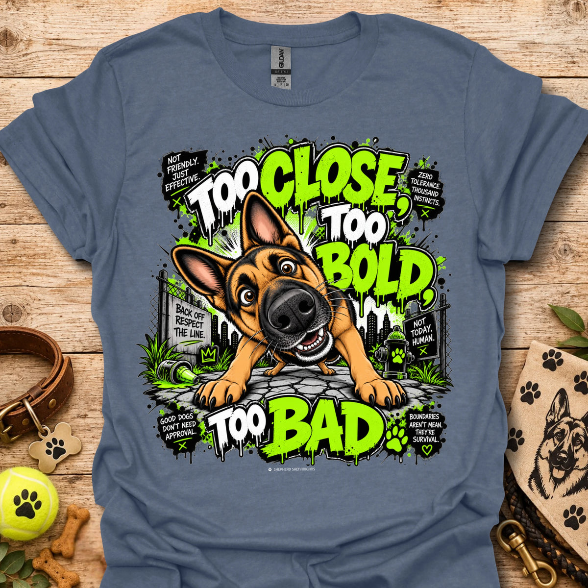 Heather indigo T-shirt with cartoon dog graphic and neon 'Too Close Too Bold Too Bad' text