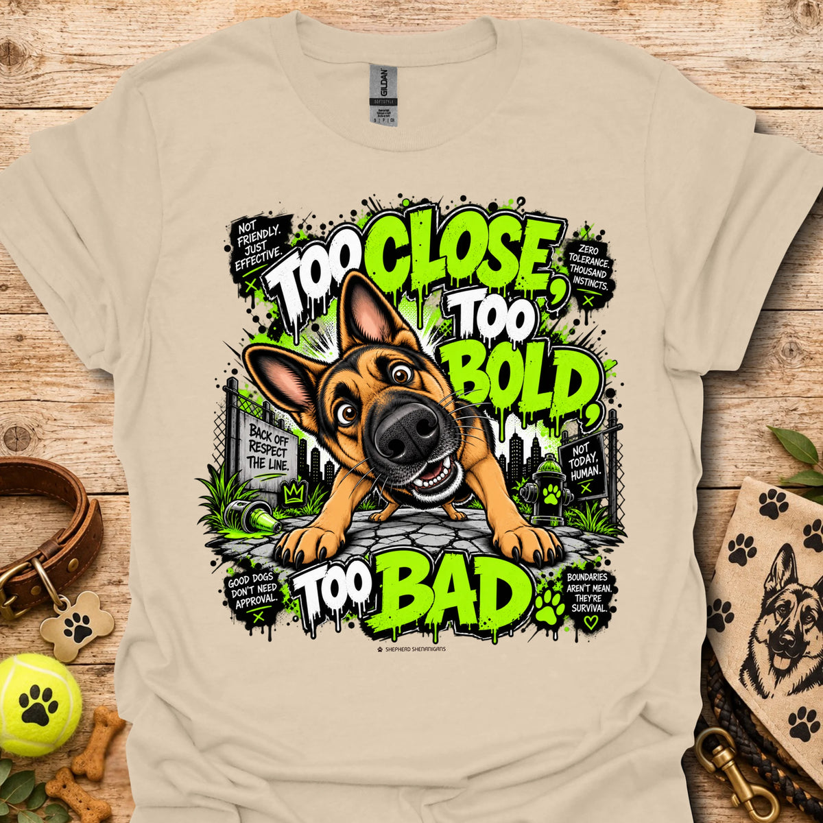 Sand T-shirt with cartoon dog graphic and neon 'Too Close Too Bold Too Bad' text