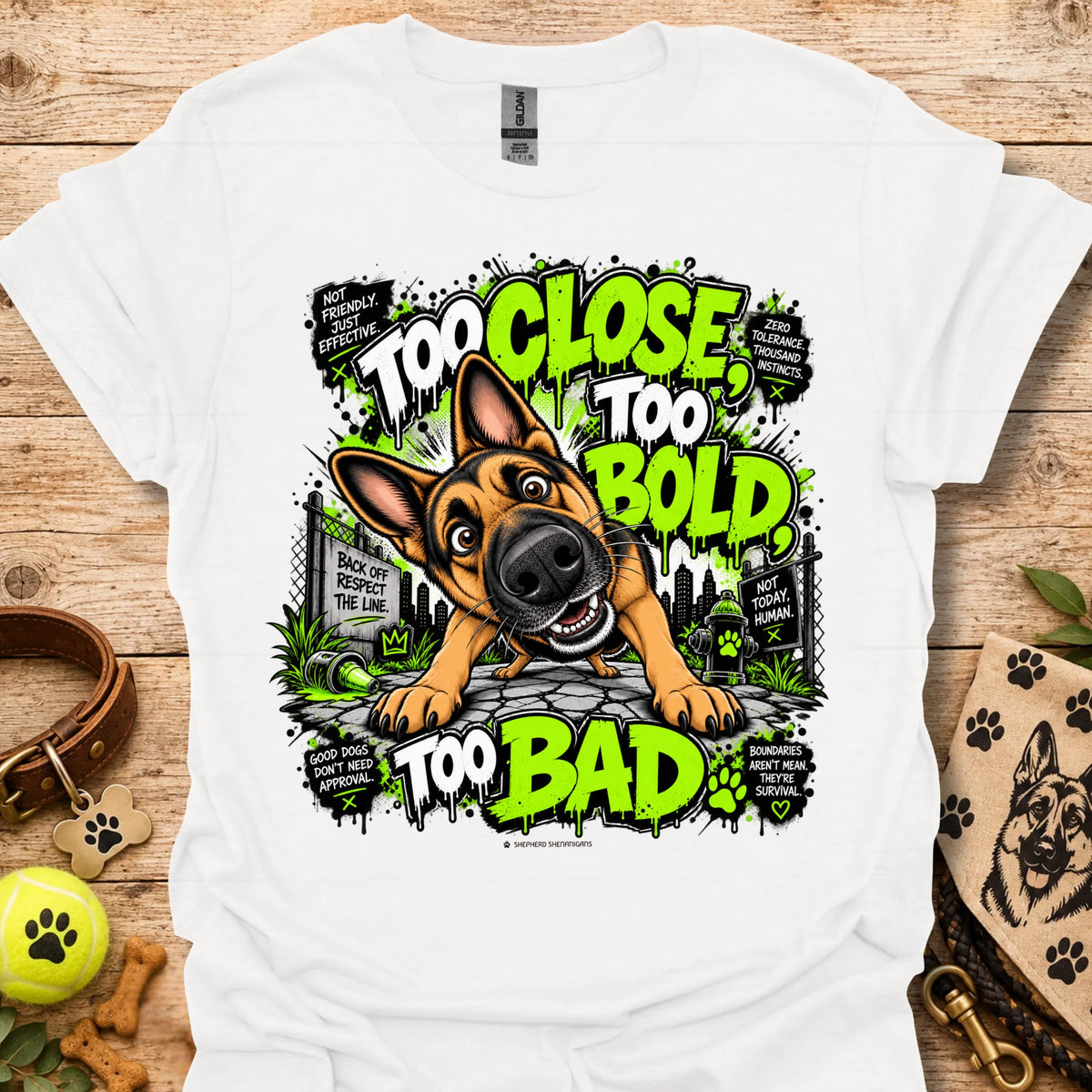 White T-shirt with cartoon dog graphic and neon 'Too Close Too Bold Too Bad' text