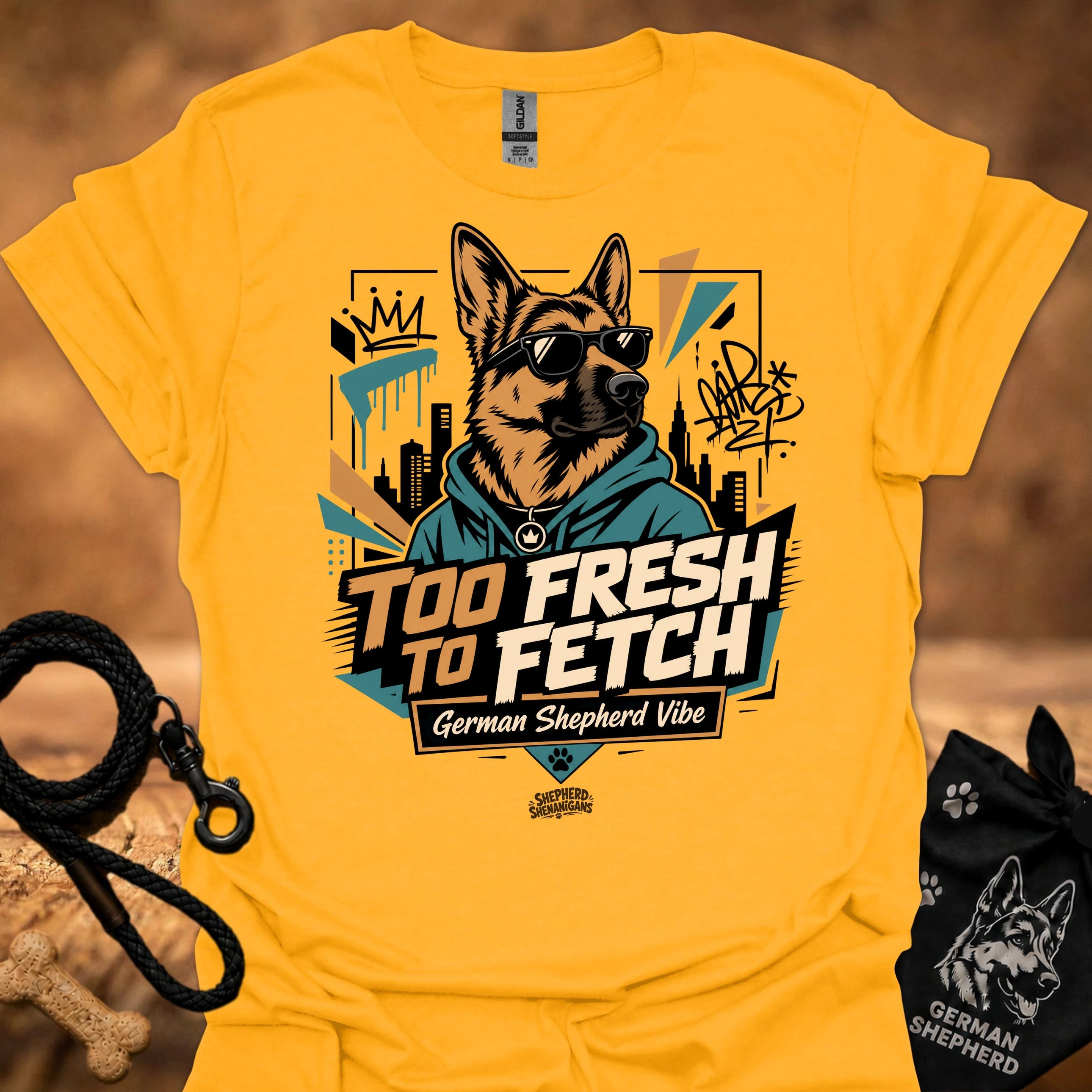 Gold/yellow graphic t-shirt with German Shepherd portrait and “Too Fresh to Fetch” print