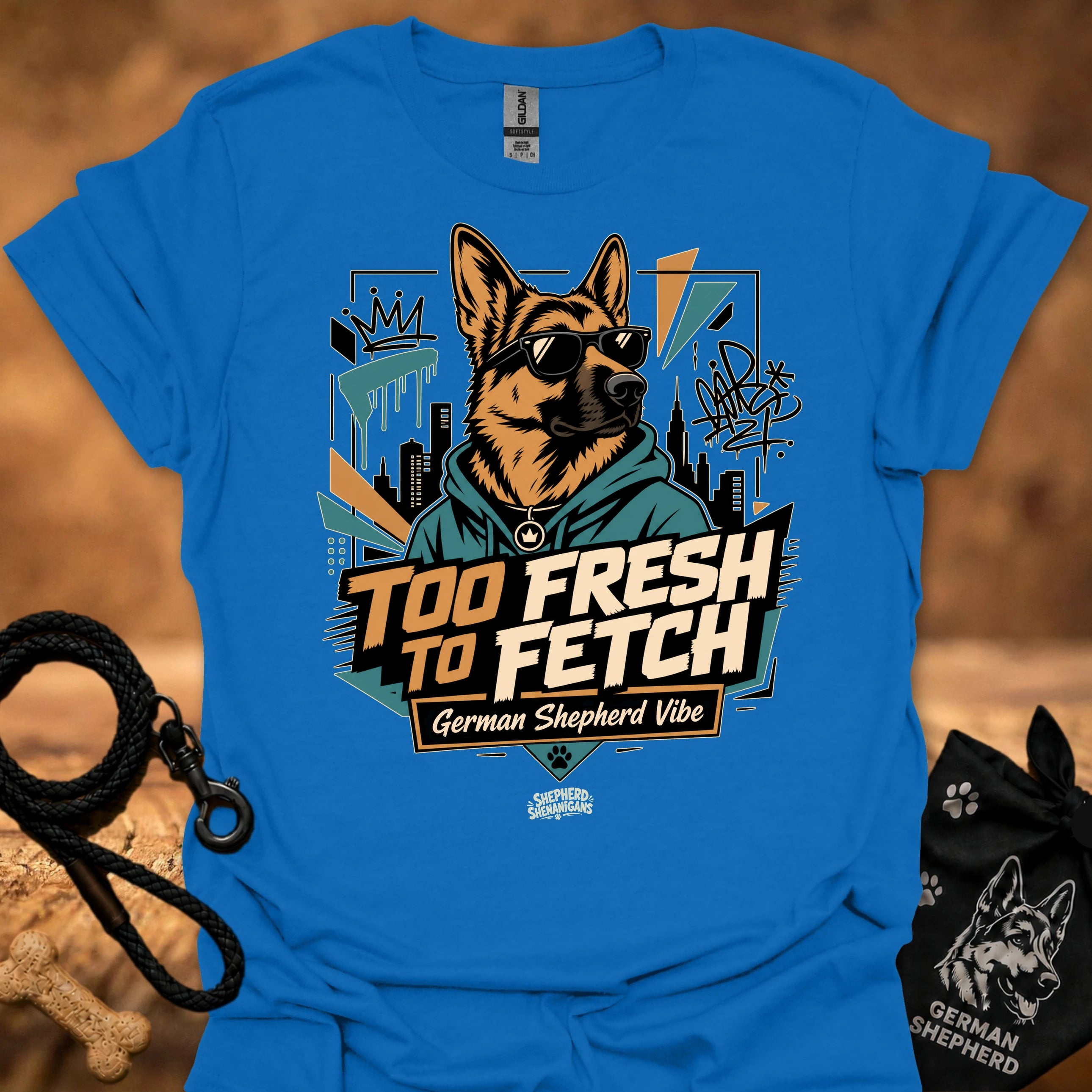 Bright blue graphic t-shirt with German Shepherd portrait and “Too Fresh to Fetch” print