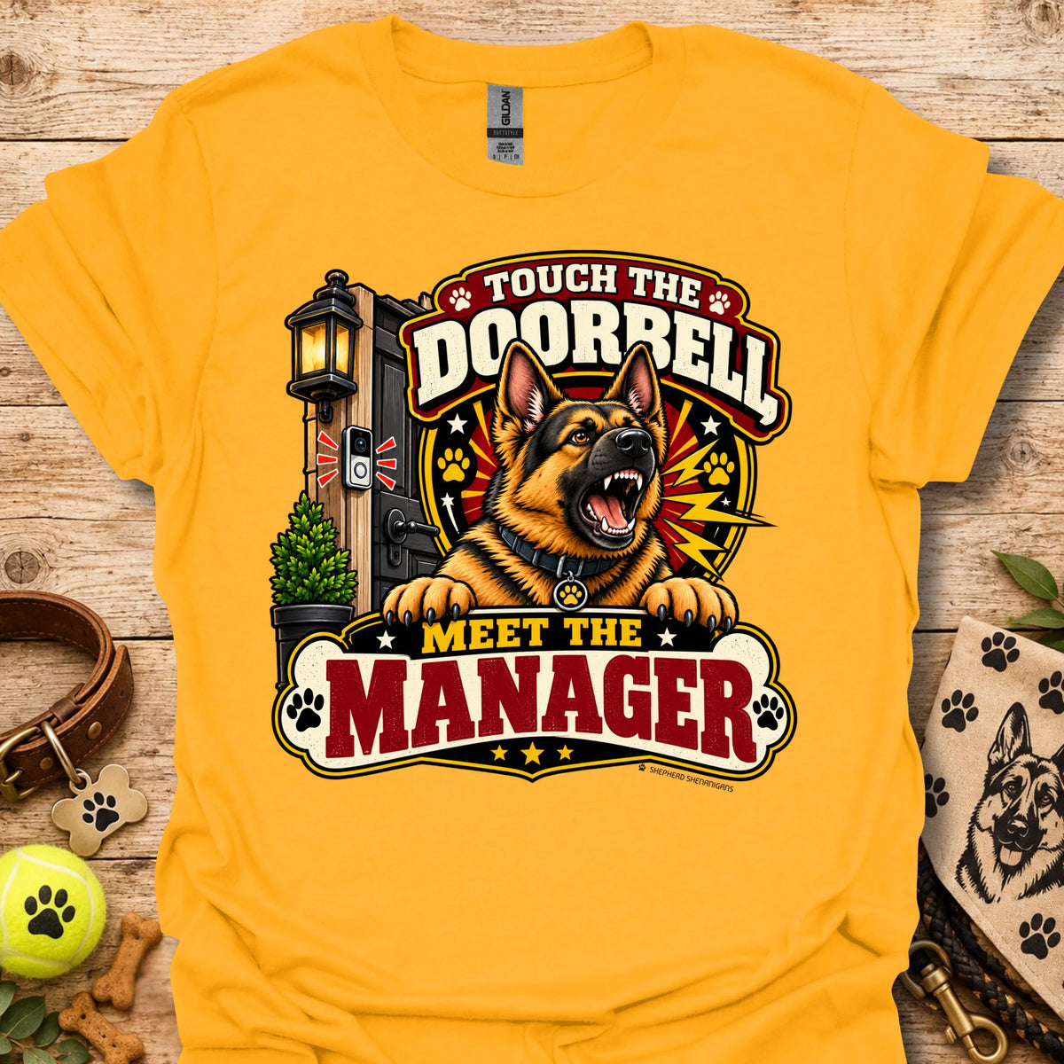 Mustard yellow short-sleeve T-shirt with colorful "Doorbell Manager" graphic front