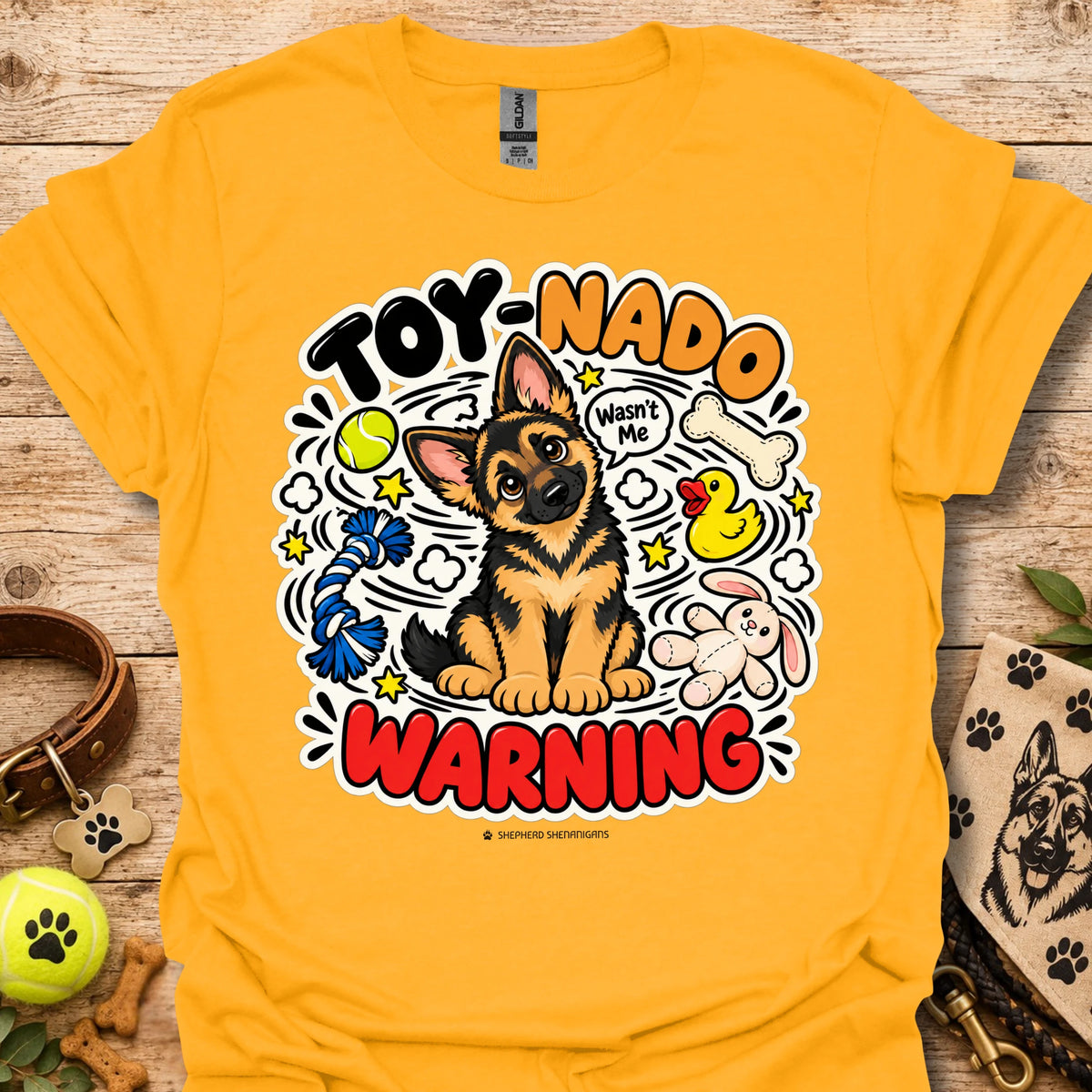 Gold yellow T-shirt with cartoon German shepherd and 'Toy-Nado Warning' graphic