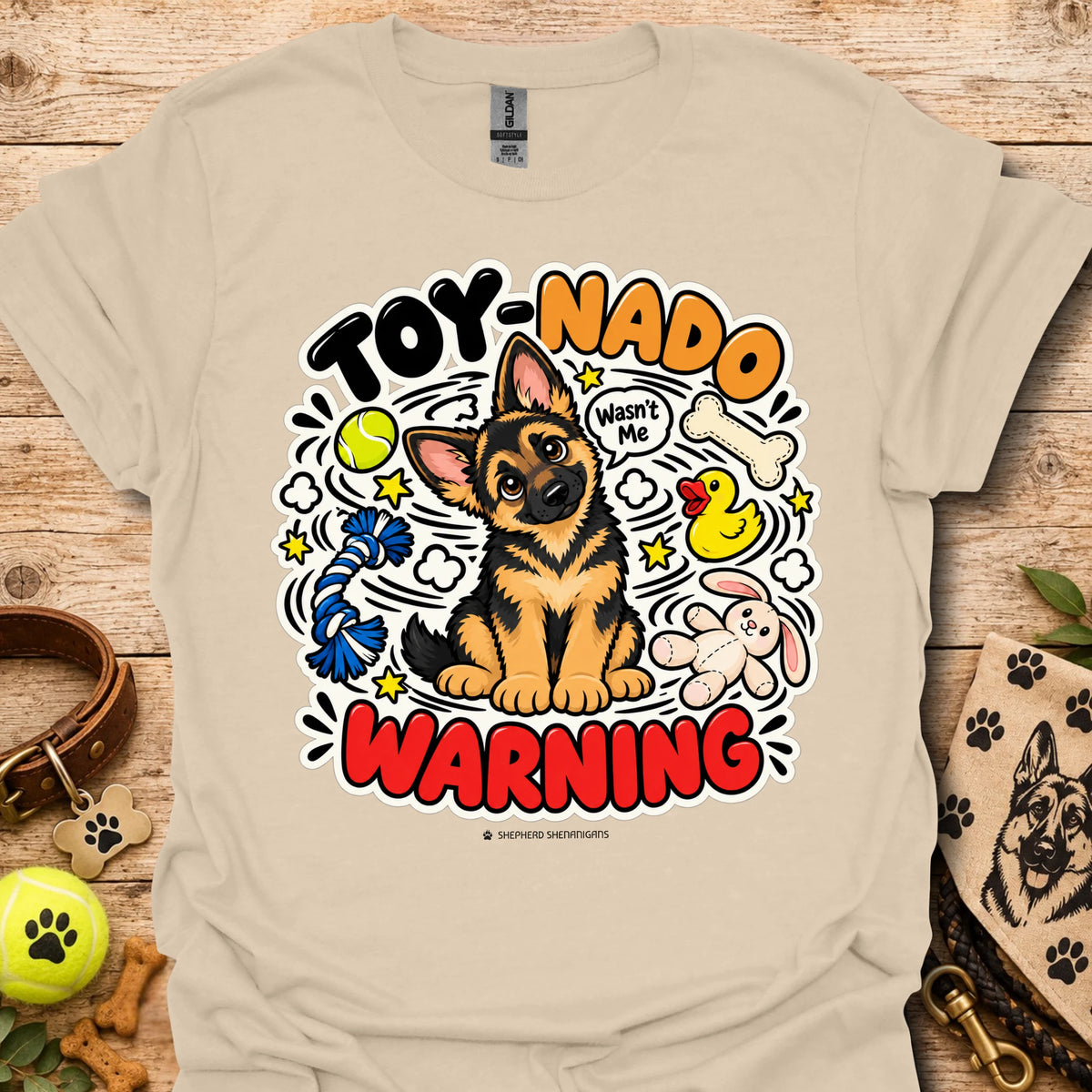 Light beige T-shirt with cartoon German shepherd and 'Toy-Nado Warning' graphic