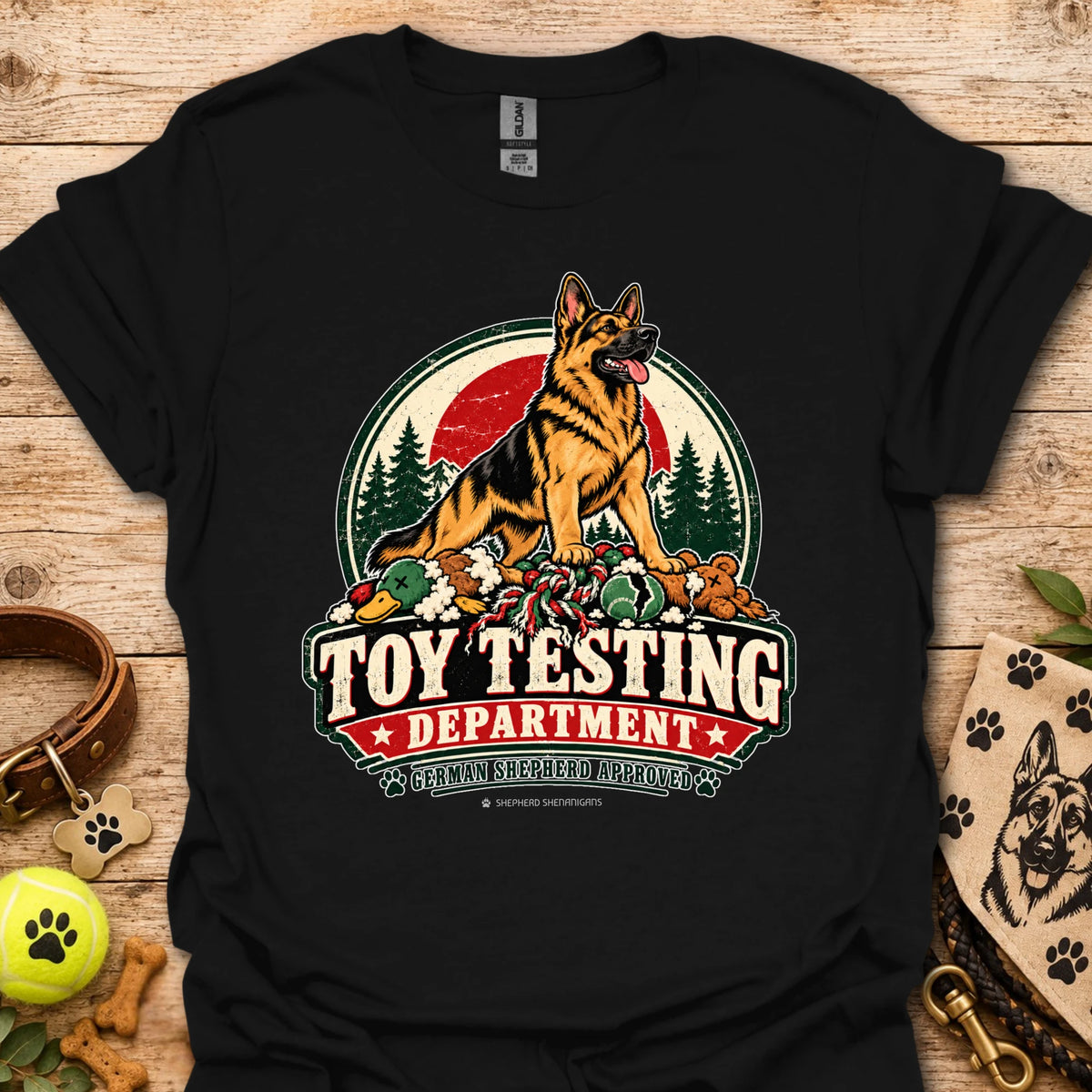 Black T-shirt with “Toy Testing Department” German shepherd graphic on chest