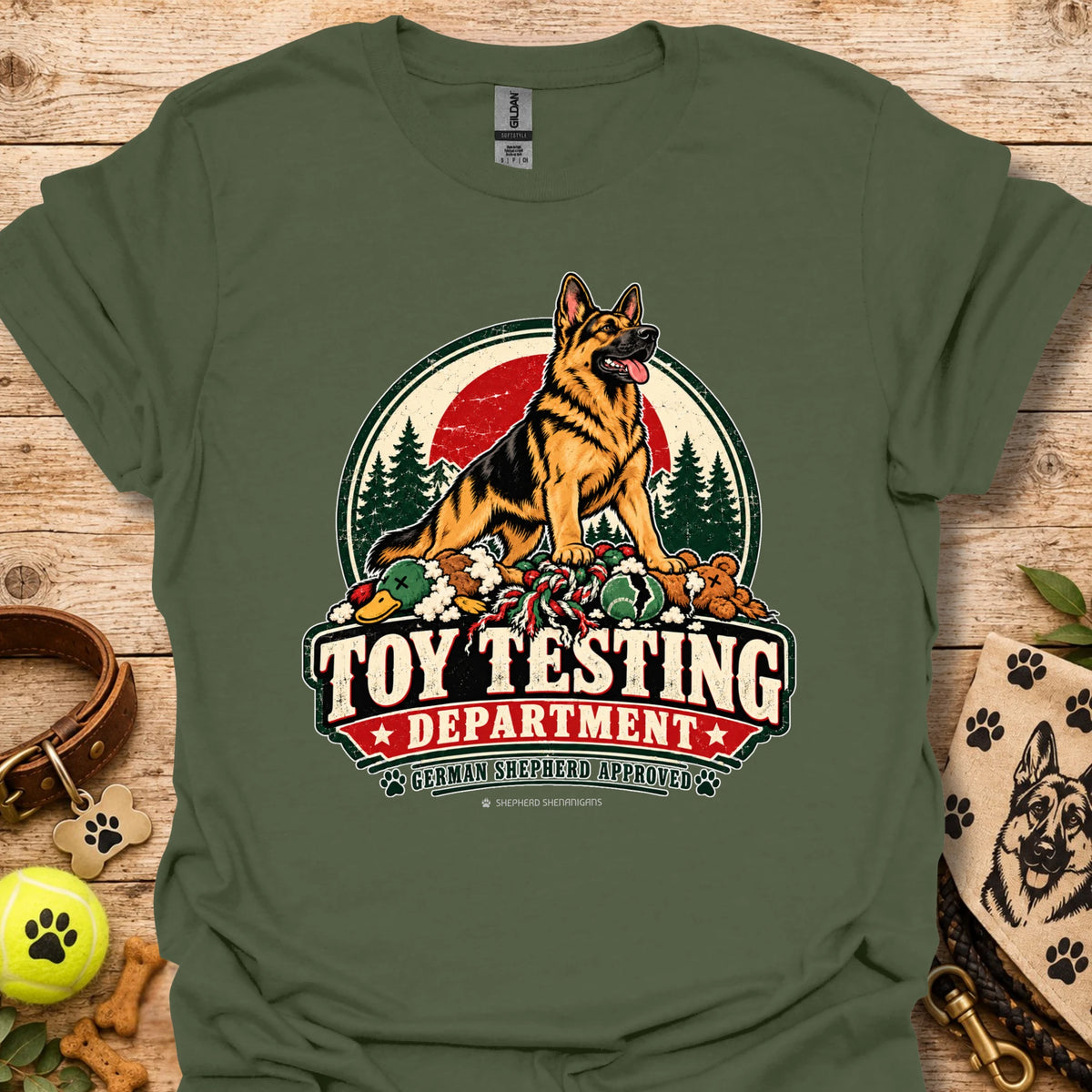 Military green T-shirt with “Toy Testing Department” German shepherd graphic on chest