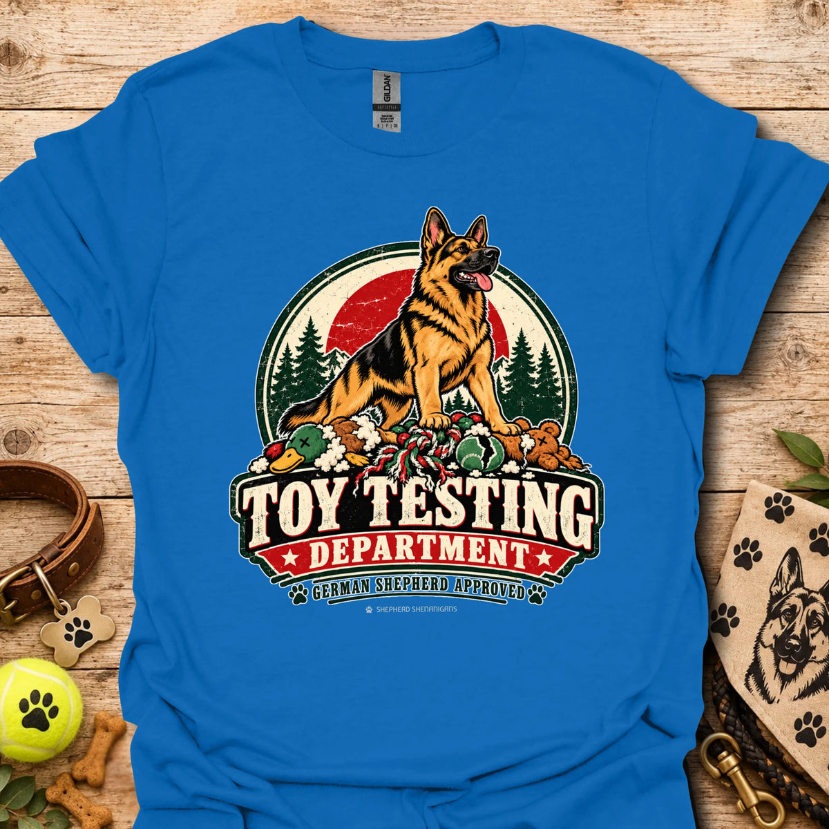 Royal blue T-shirt with “Toy Testing Department” German shepherd graphic on chest