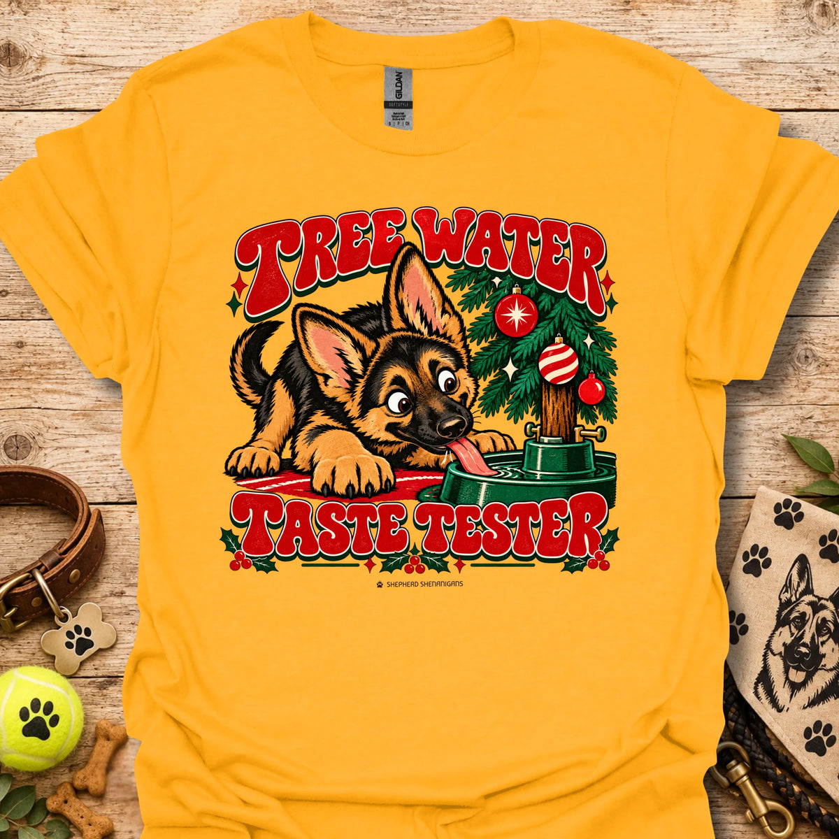 Gold crew-neck t-shirt with "Tree Water Taste Tester" dog and tree graphic