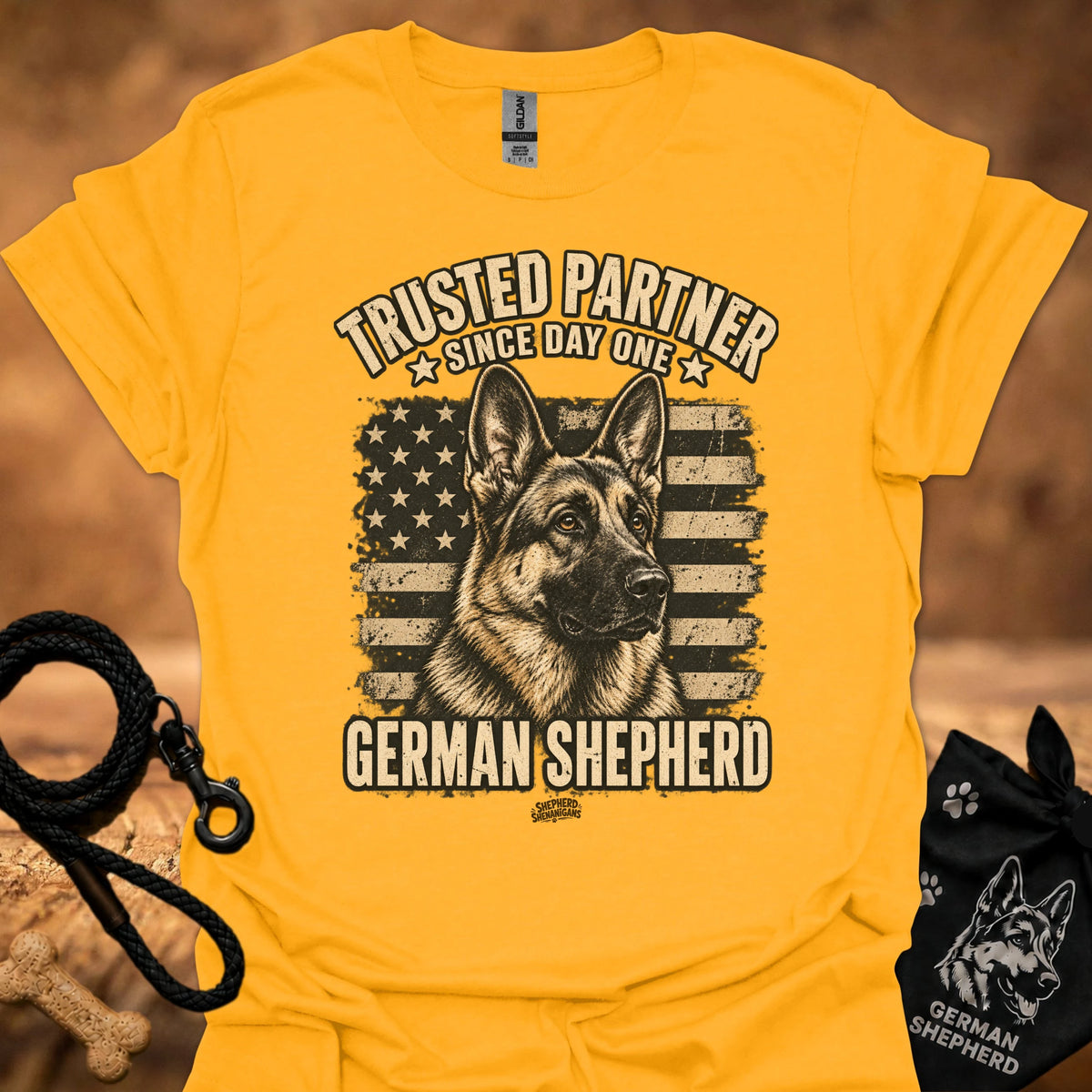 Gold crewneck T-shirt with German Shepherd front graphic and stars-and-stripes print.