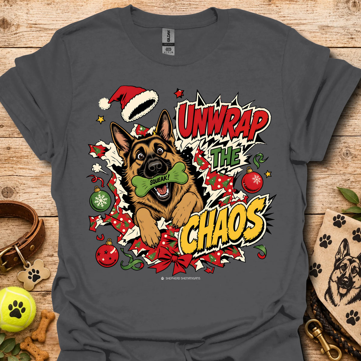 Charcoal graphic dog t-shirt with "Unwrap the Chaos" text and Santa hat