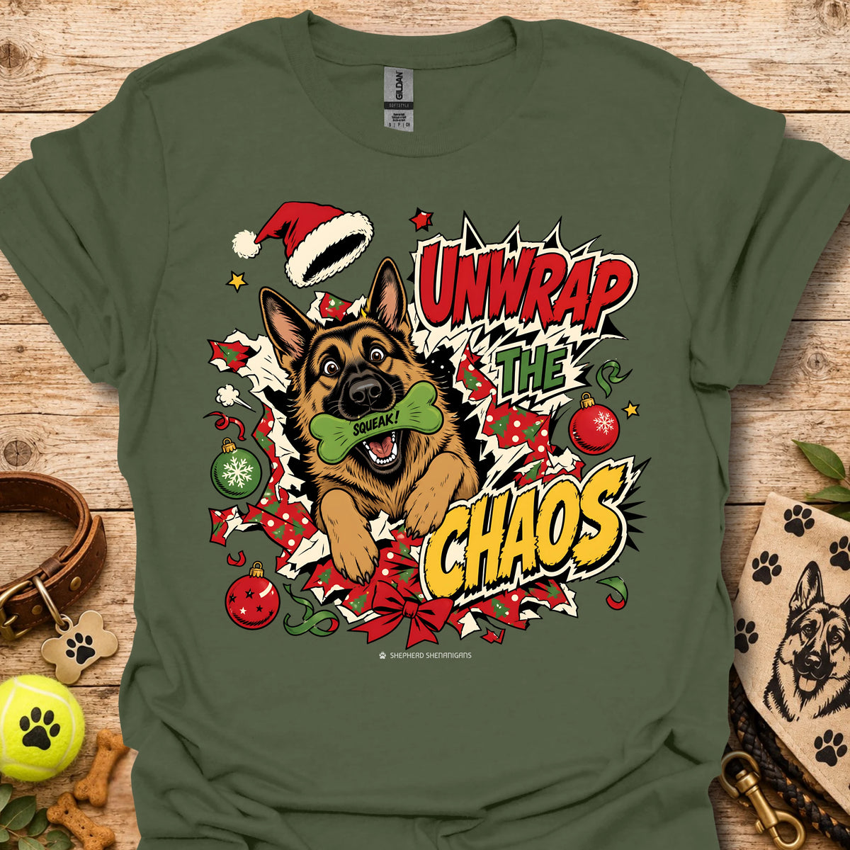 Military green graphic dog t-shirt with "Unwrap the Chaos" text and Santa hat