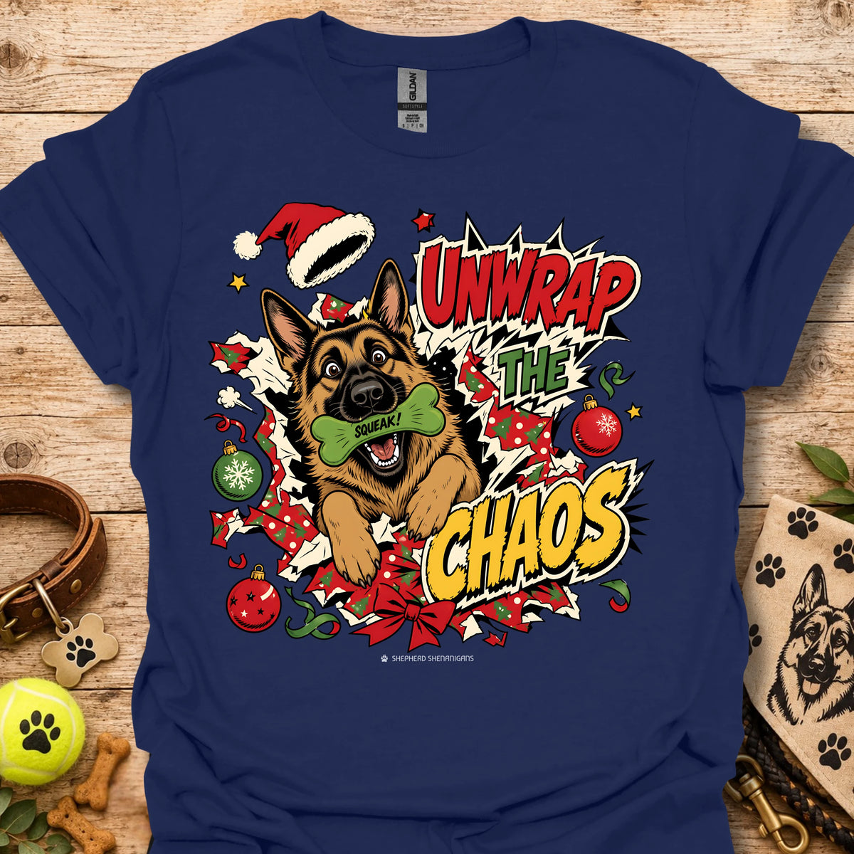 Navy graphic dog t-shirt with "Unwrap the Chaos" text and Santa hat
