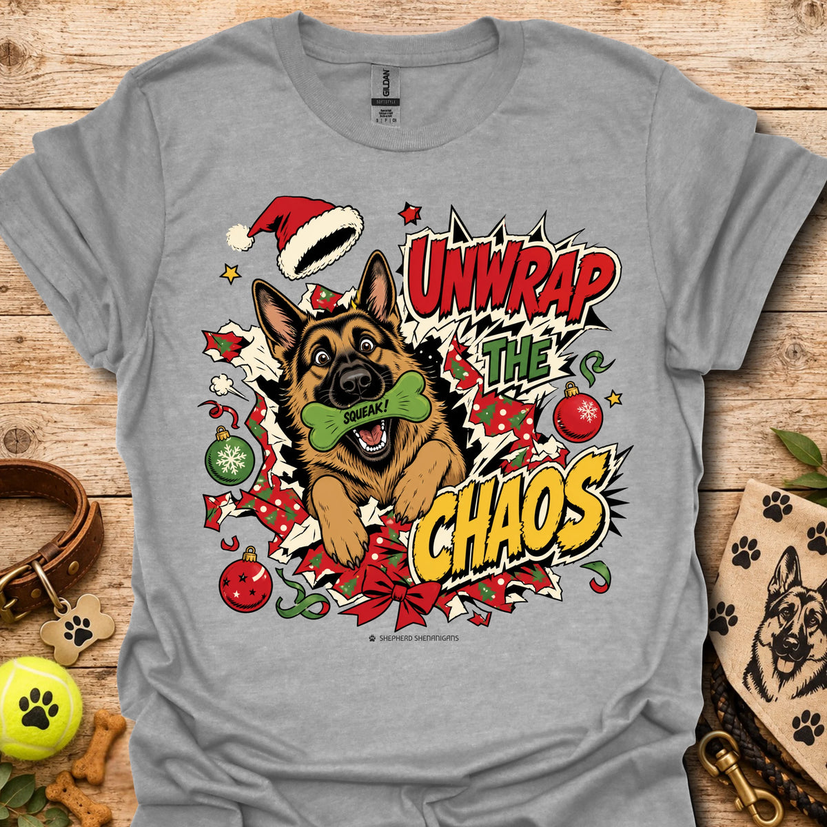 Sport grey graphic dog t-shirt with "Unwrap the Chaos" text and Santa hat