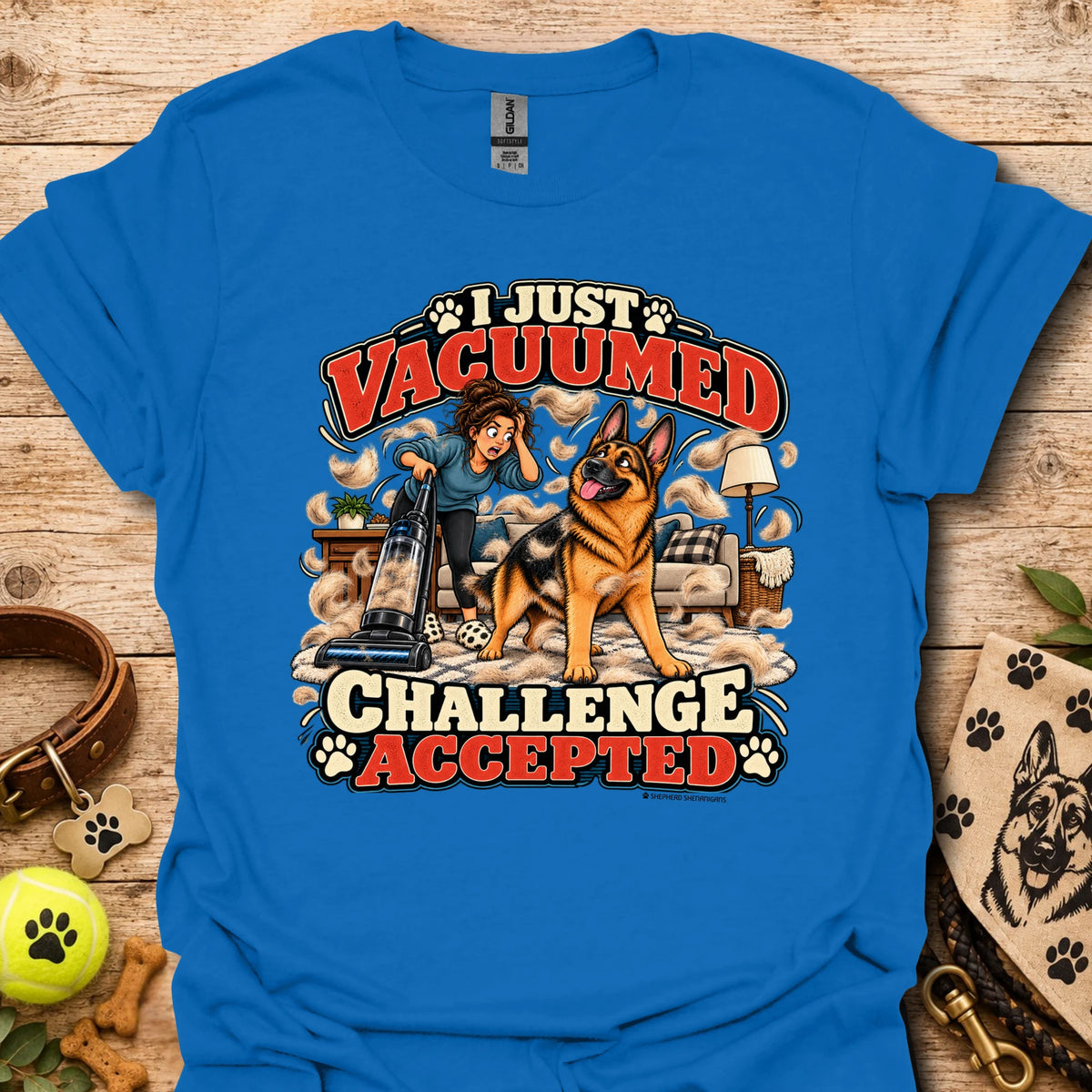 Royal blue crew-neck T-shirt with front graphic: “I Just Vacuumed Challenge Accepted”.