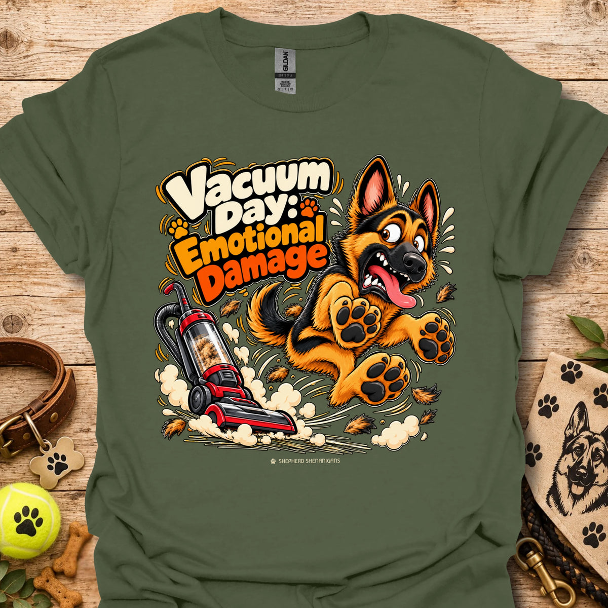 Olive green T-shirt with cartoon vacuum and German Shepherd graphic, “Vacuum Day Emotional Damage” text