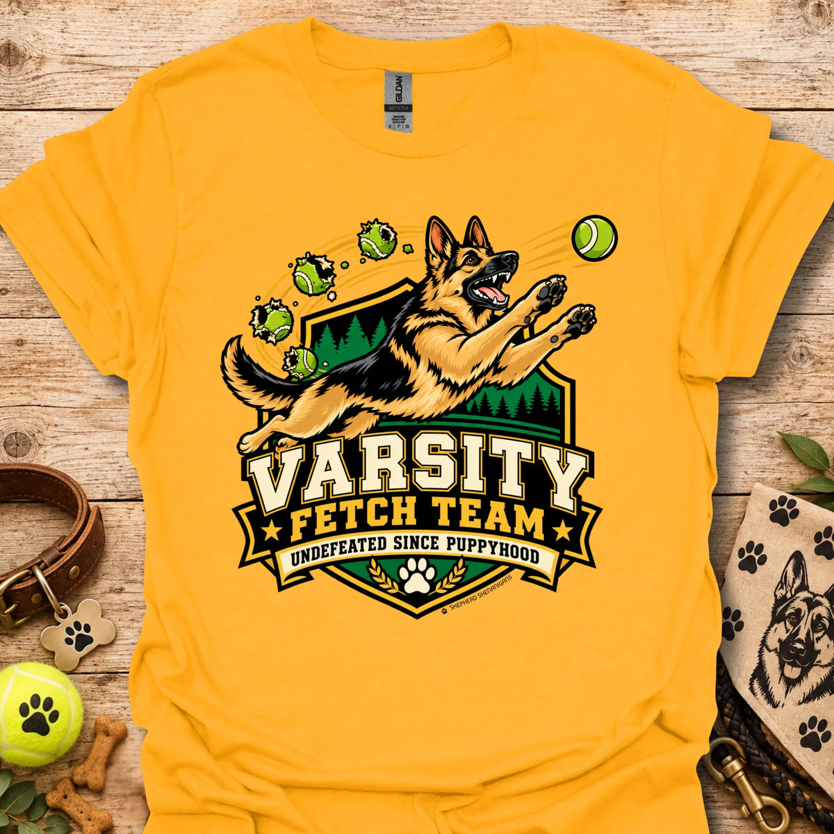 Gold varsity-style team t-shirt with dog mascot and Varsity Fetch Team crest