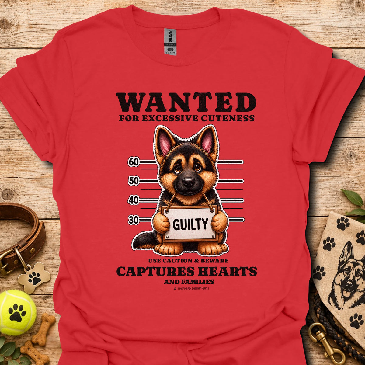 Red T-shirt with “WANTED” dog mugshot graphic and bold text
