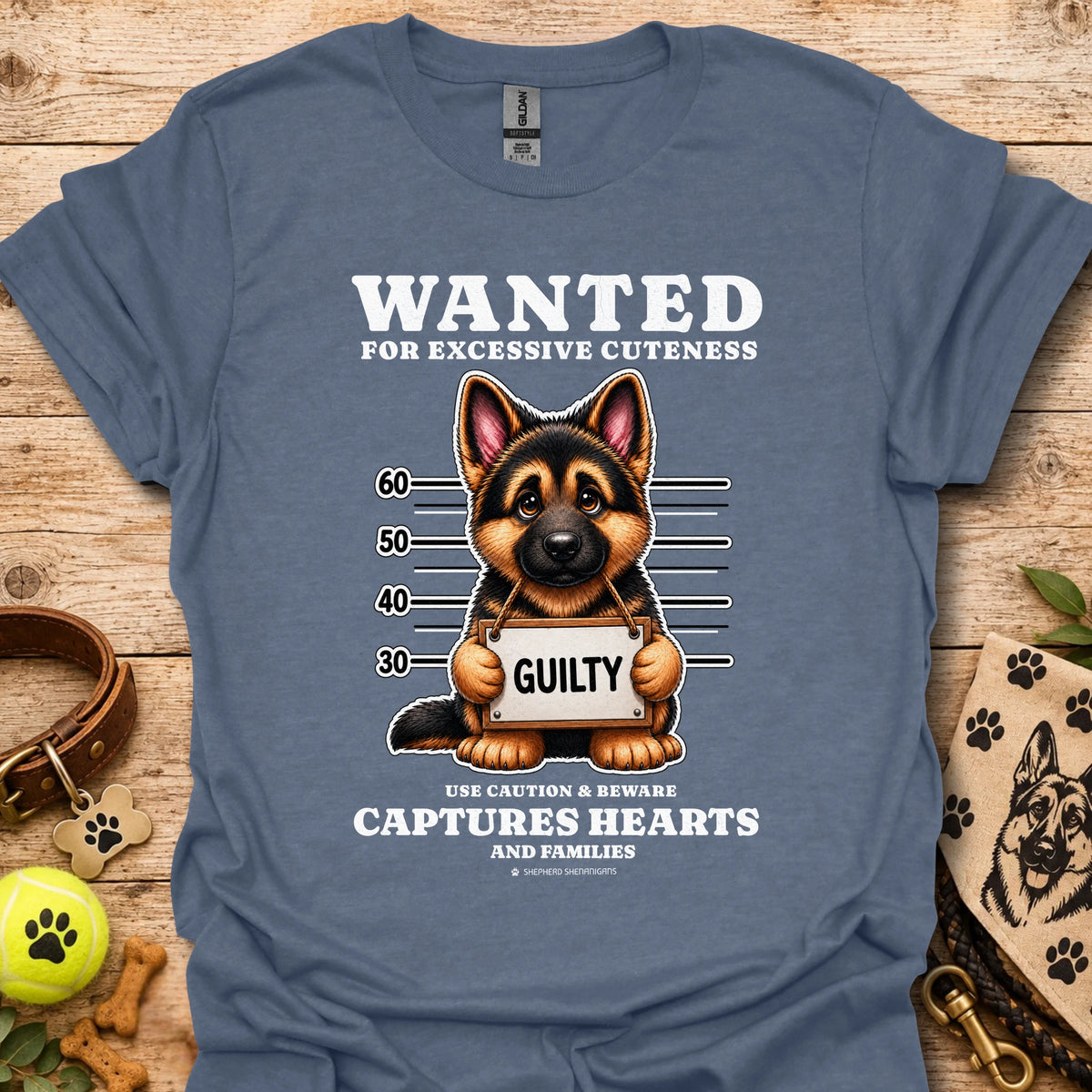 Heather indigo T-shirt with “WANTED” dog mugshot graphic and bold text