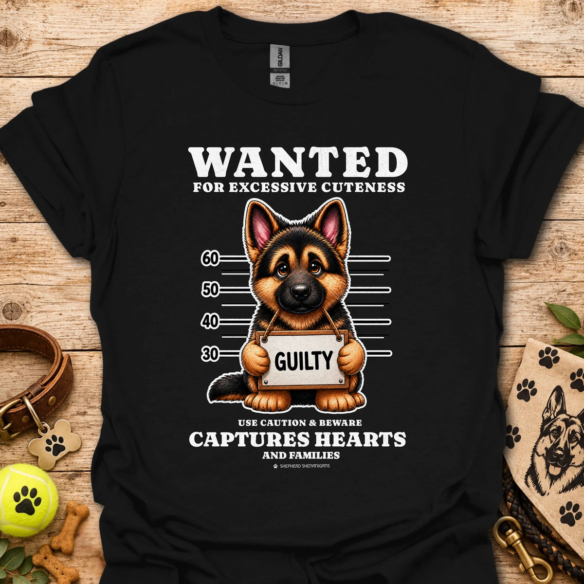 Black T-shirt with “WANTED” dog mugshot graphic and bold text