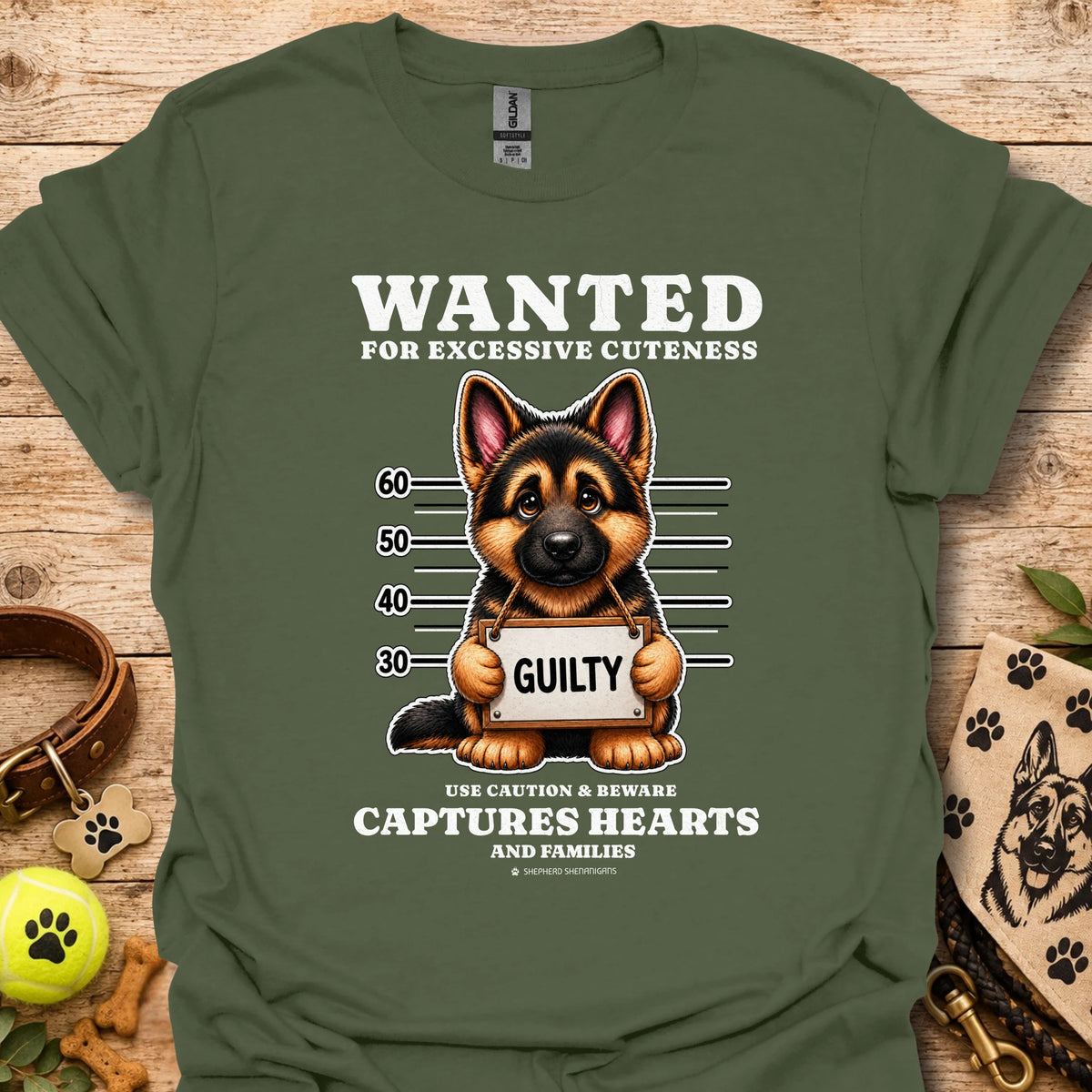 Military green T-shirt with “WANTED” dog mugshot graphic and bold text