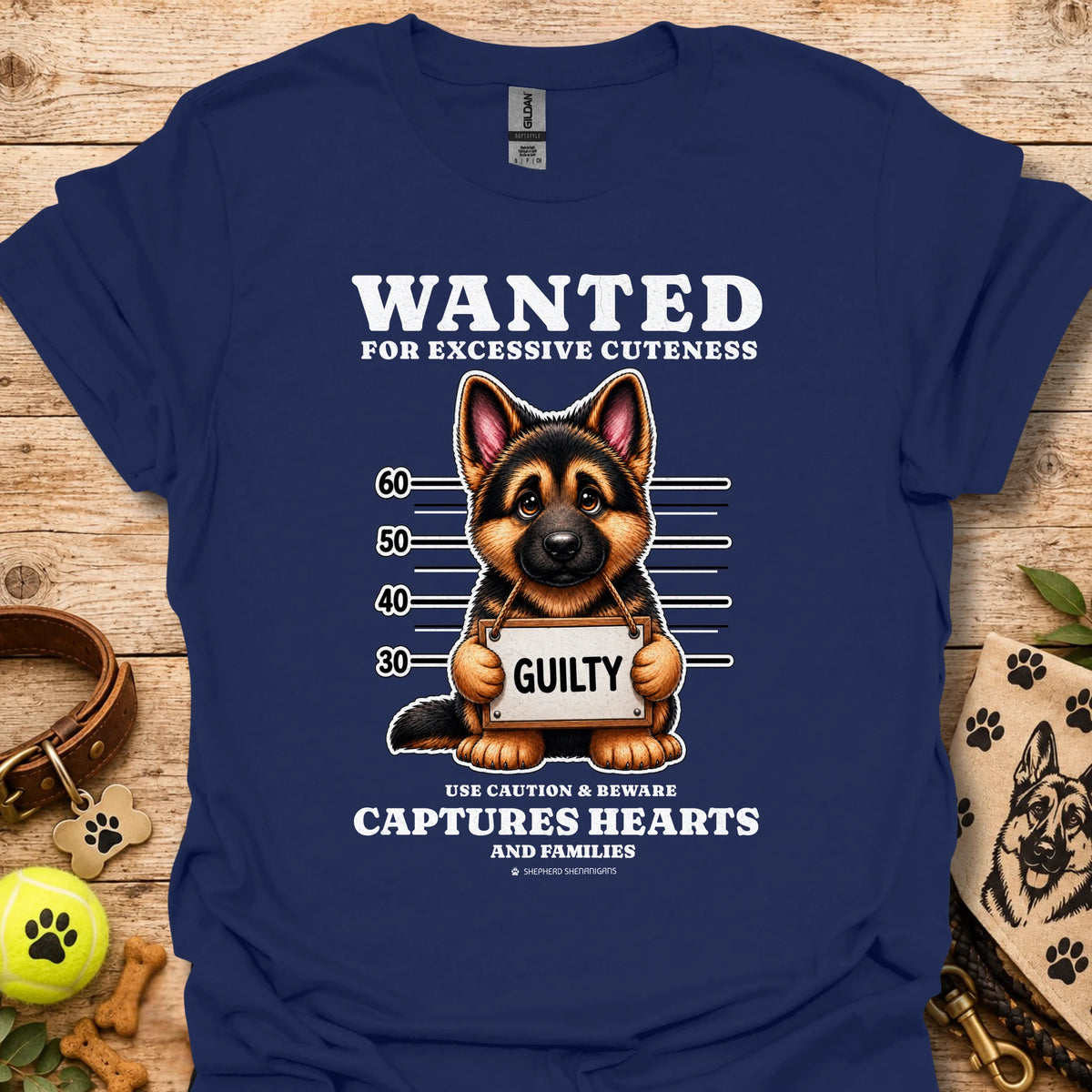 Navy T-shirt with “WANTED” dog mugshot graphic and bold text