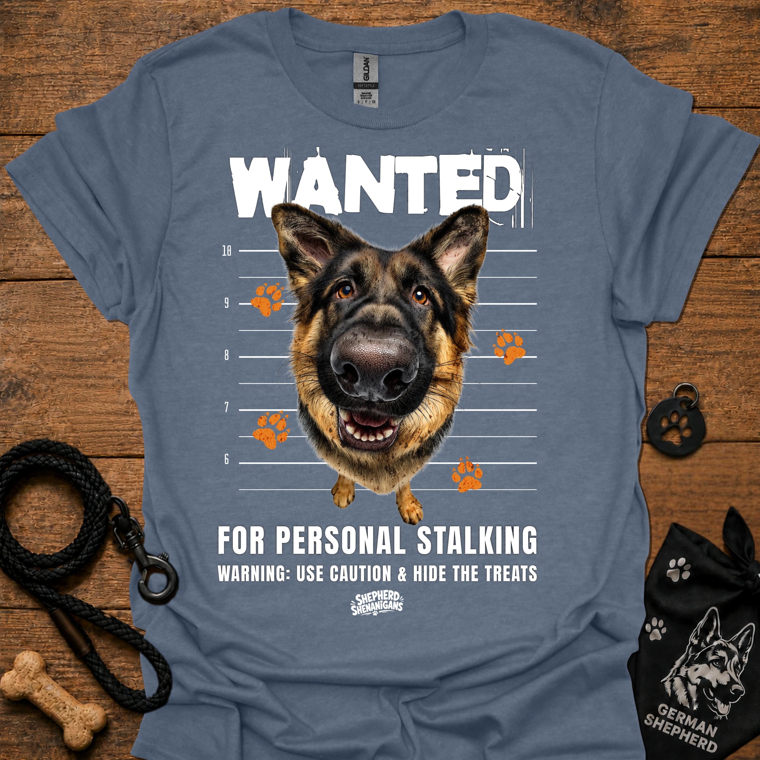 Light blue T-shirt with German shepherd face and bold “WANTED” graphic with warning text