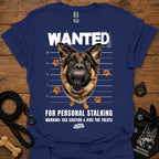 Navy T-shirt with German shepherd face and bold “WANTED” graphic with warning text