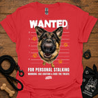 Red T-shirt with German shepherd face and bold “WANTED” graphic with warning text