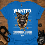 Royal blue T-shirt with German shepherd face and bold “WANTED” graphic with warning text