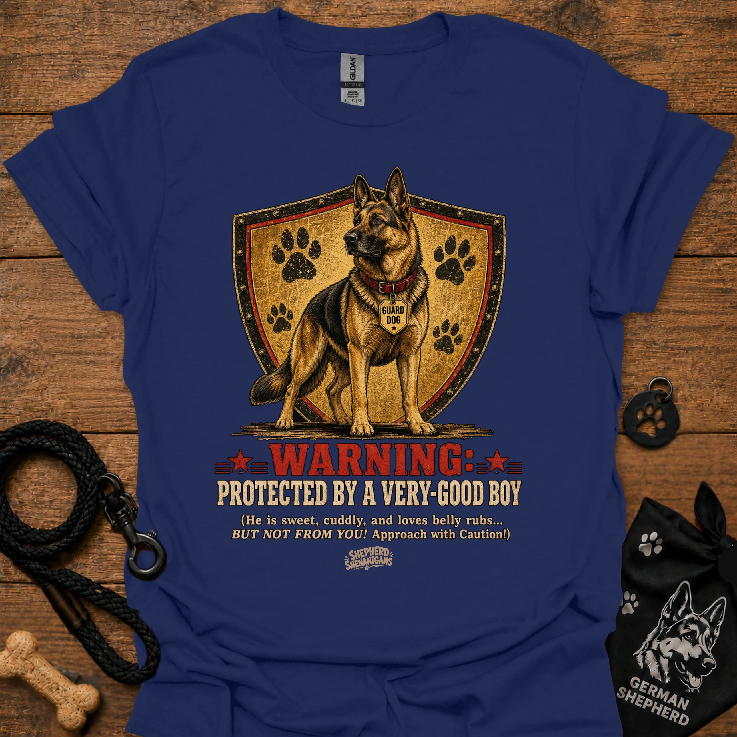 Navy dog graphic T-shirt with shield, paw prints, and “Warning” text