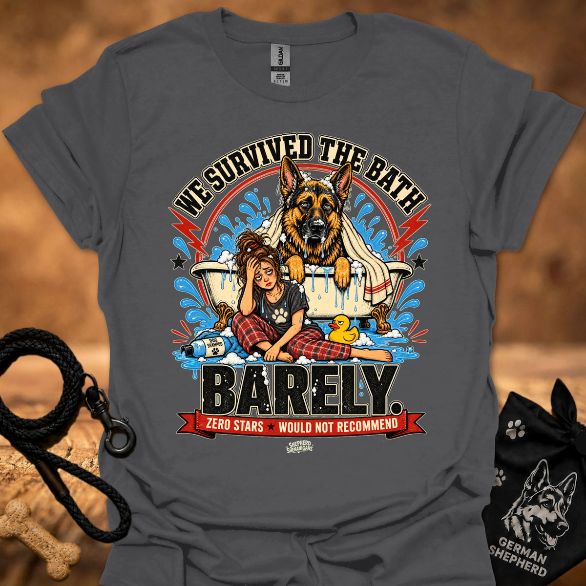 Dark gray T-shirt with large dog-and-girl cartoon graphic, crew neck.