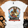 White T-shirt with large dog-and-girl cartoon graphic, crew neck.