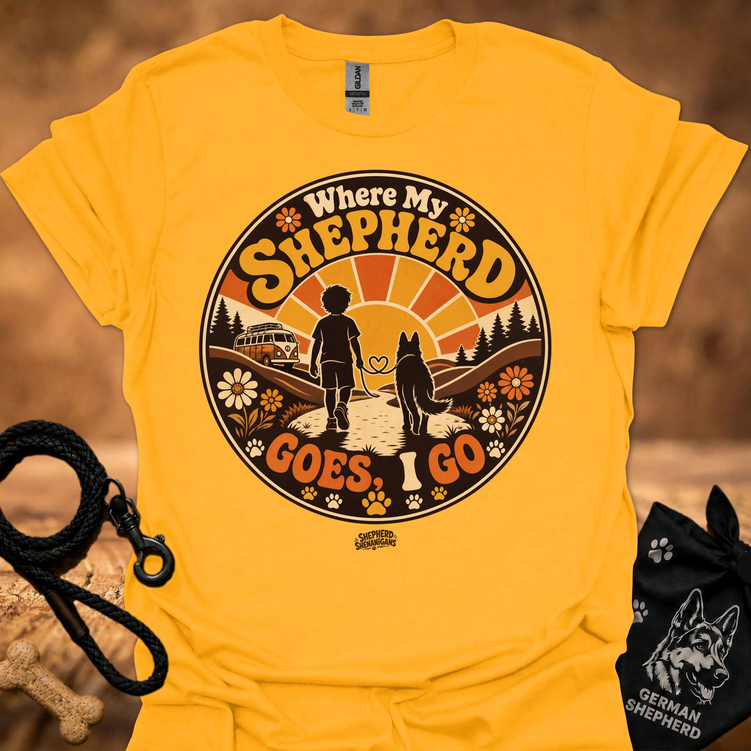 Gold graphic T-shirt with circular “Where My Shepherd Goes ! Go” print, crew neck