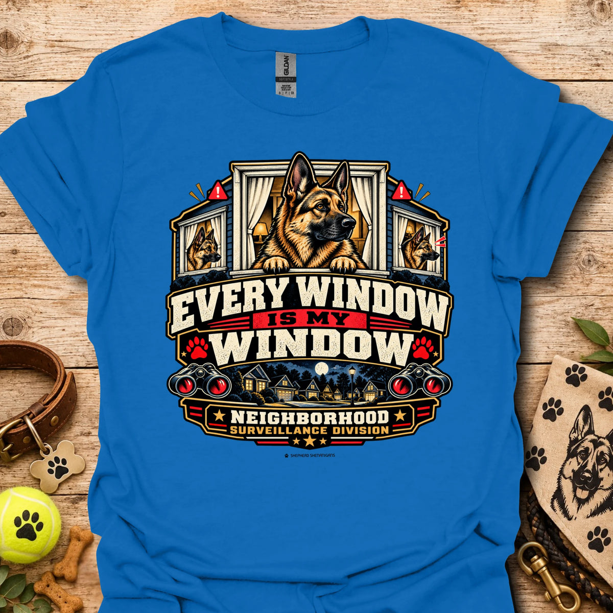 Royal blue window-surveillance graphic t-shirt with dog in window and slogan