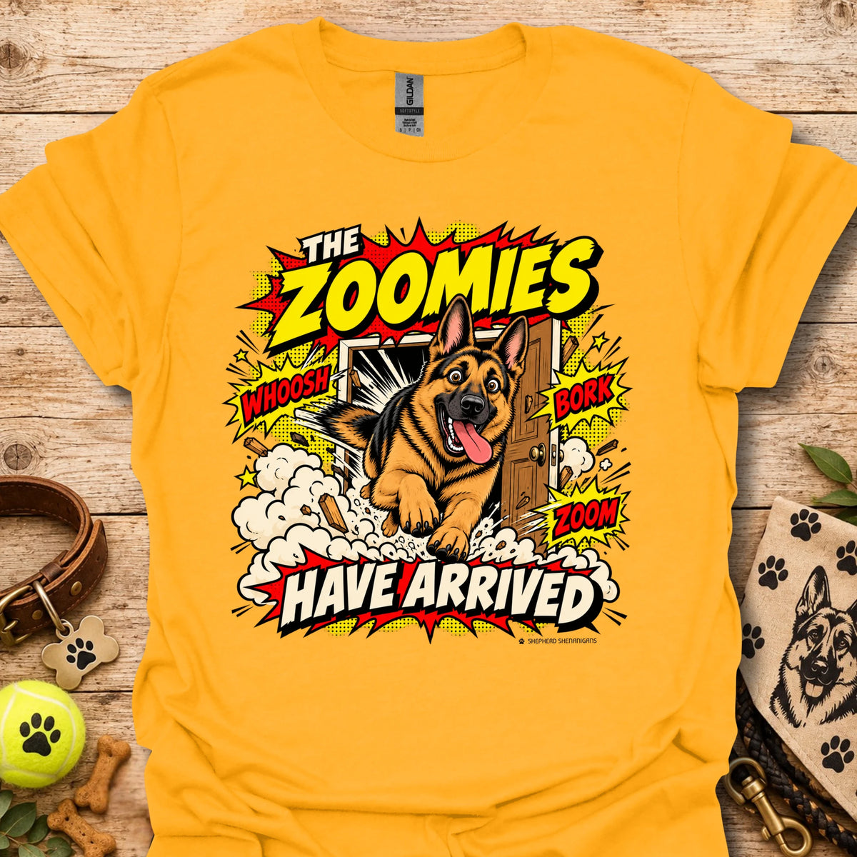 Gold T-shirt with playful dog graphic and 'THE ZOOMIES HAVE ARRIVED' text